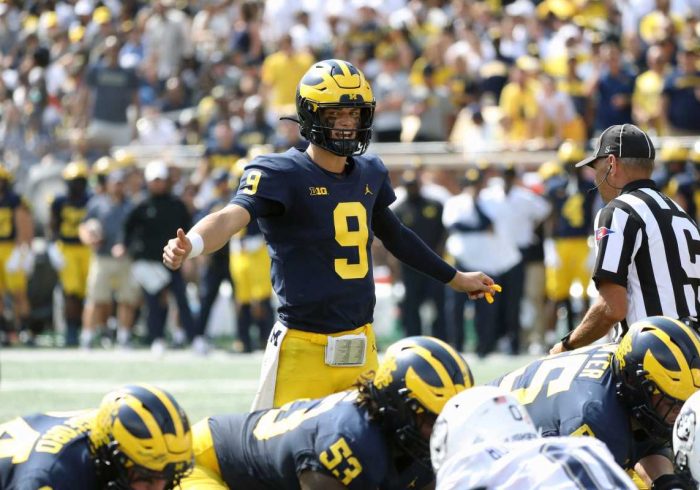Michigan Uses Eight Quarterbacks in Blowout Win Over UConn