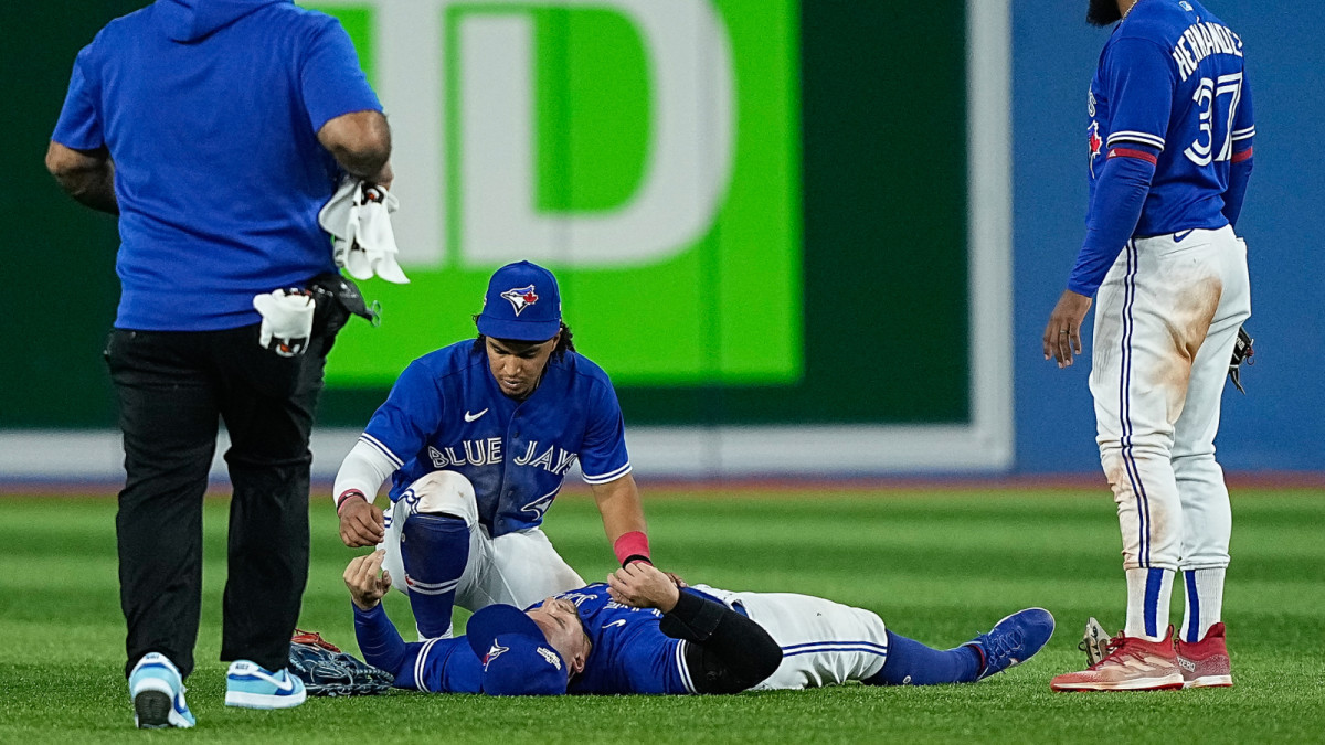 Jays’ Springer Carted Off Field After Outfield Collision