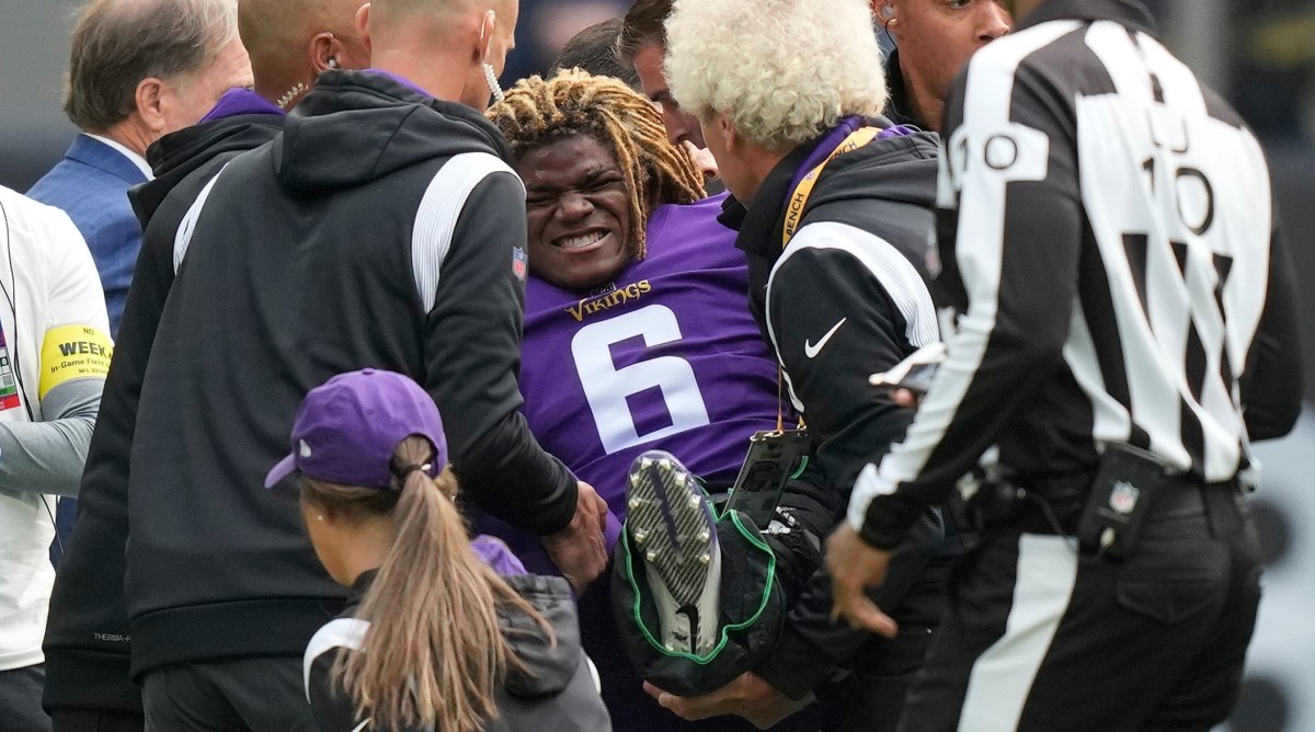 Vikings’ Lewis Cine Taken to Hospital After Leg Injury vs. Saints