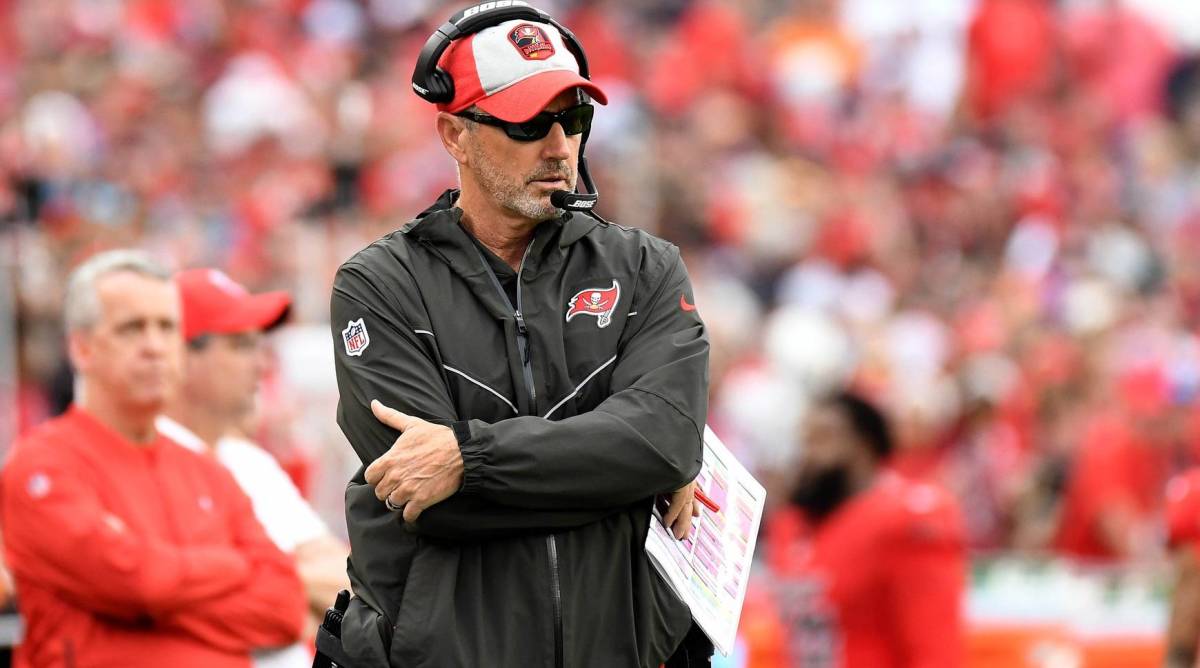 Tampa Bay Buccaneers head coach Dirk Koetter looks on from the sidelines during a game.