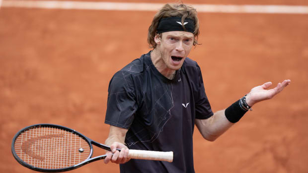 Rublev reacts to a point during his third-round match at the French Open.