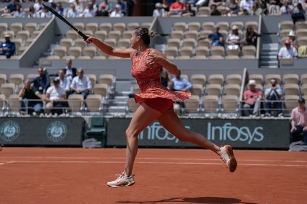 Sabalenka charged to a fourth-round victory at Roland Garros, with several front-row seats to the match left empty.